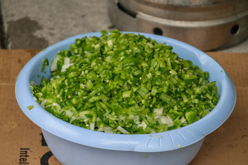  dish of freshly cut green peppers