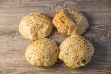 local bread on the wooden background in Turkey.