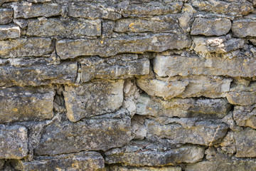 The old wall of gray stones