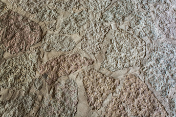 The unusual pattern on a wall of clay