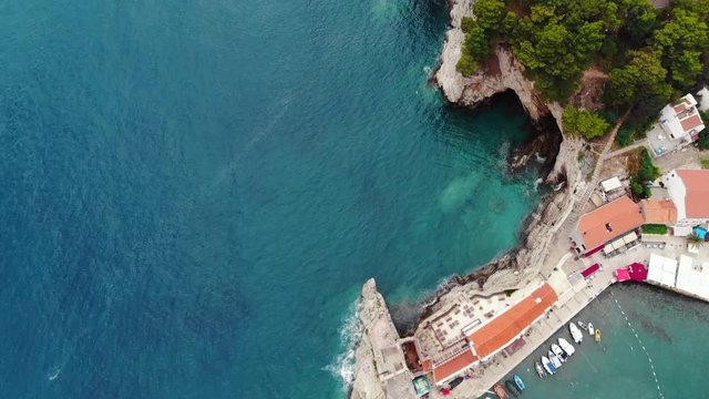 flight over old European city on Adriatic coast, drone shot