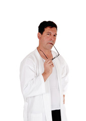 Tall handsome man in white bathrobe