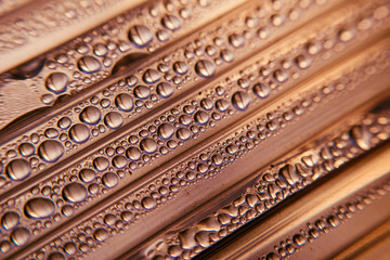 Water drops on a gradient background, covered with drops of water - condensation, close-up. Striped. Free space. blue