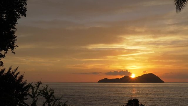 Sundown over the island of Mararison or Malalison in the Philippines