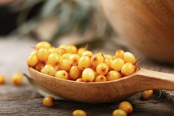 raw buckthorn in a spoon