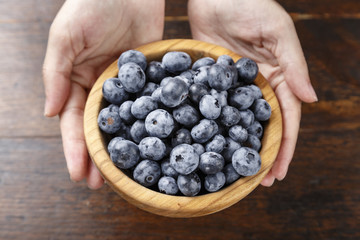 blueberry in a wooden plate