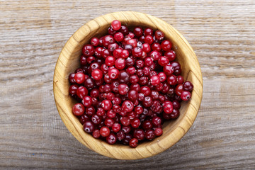 cranberries in a wooden plate