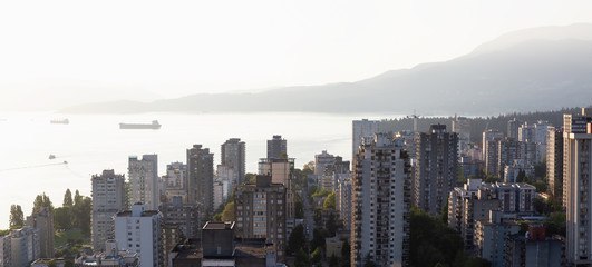 Aerial panorama of resiential buildings in the downtown city with an ocean view. Taken in Vancouver, British Columbia, Canada.