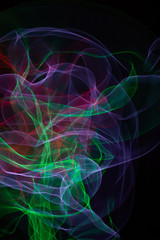 Abstract smoke of colors. Pattern of soft waveforms.