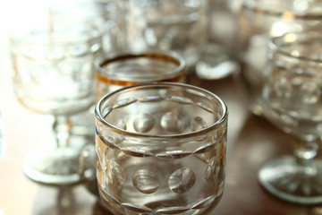 Old dusty wine glasses. Close-up. Background.