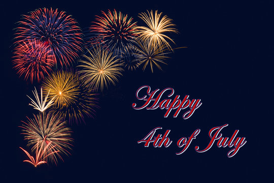 Festive fireworks display for a Happy 4th of July celebration. Dark blue night sky background.