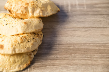local bread on the wooden background in Turkey.