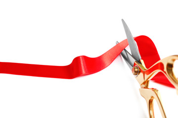 Ribbon and scissors on white background. Ceremonial red tape cutting