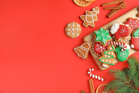 Flat lay composition with tasty homemade Christmas cookies on color background