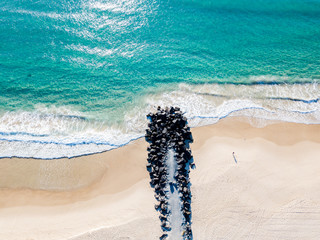 An aerial view of Palm Beach on the Gold Coast in Queensland Australia on a clear blue water day