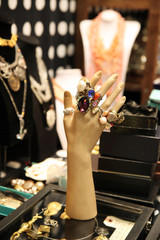 Obraz premium Lot of rings for women on the hand of the dummy
