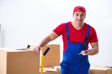 Contractor worker moving boxes during office move