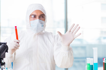 Male chemist working in lab