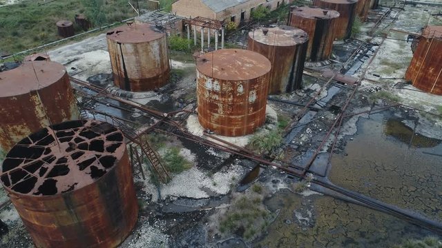 Overhead Drone Flight Over Leaking Oil Storage Tanks, Environmental Disaster In Albania, Europe