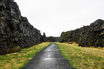 a picturesque winding road to the gorge between the rocks close-up.
