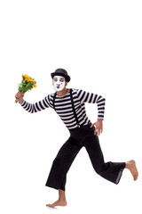 Mime with bunch of flowers isolated on white