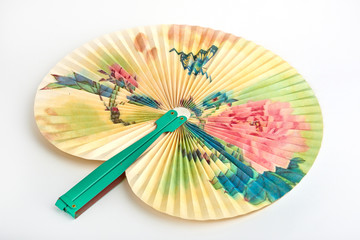 Closeup of Traditional Chinese paper fan on white background.Hand paper fan