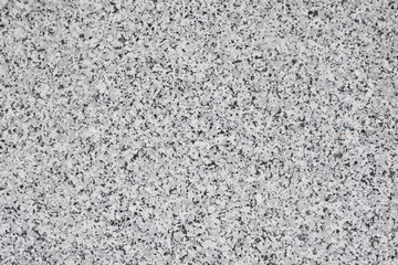 Textured background of a block of granite