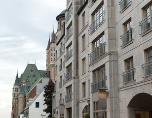 Fototapeta na wymiar Frontenac castle and modern buildings in Quebec city, Canada
