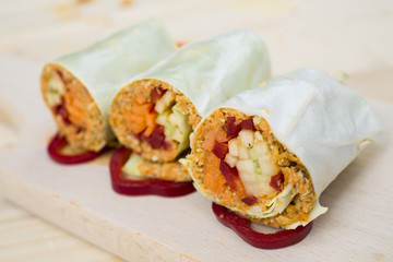 cabbage rolls with carrots. apple, pepper