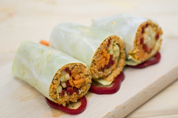 cabbage rolls with carrots. apple, pepper