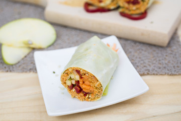 cabbage rolls with carrots. apple, pepper
