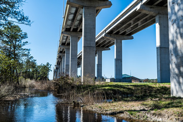 The Veterans Bridge in Chesapeake Virginia rises above the river and the marshes