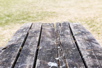 Fototapeta premium Abstract background from wooden table top with blurred nature
