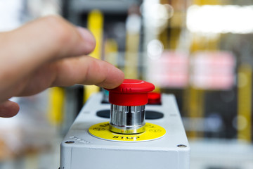 Red Emergency Button in the Factory  Safety Push in Industrial manufacturing to Stop