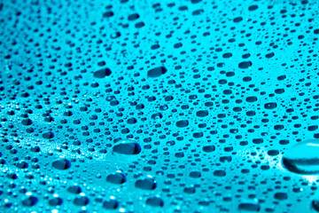 Water droplet as background / Wate is a polar inorganic compound that is at room temperature a tasteless and odorless liquid