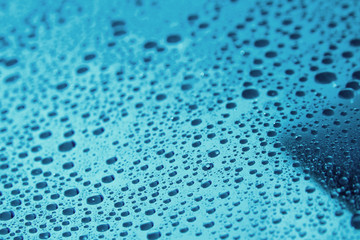 Water droplet as background / Wate is a polar inorganic compound that is at room temperature a tasteless and odorless liquid
