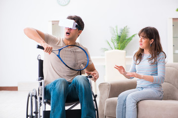 Disabled man with virtual glasses 