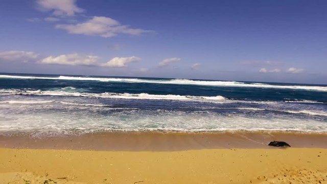 Hookipa Beach Maui Hawaii &ndash; 4k video of Hookipa Beach on a windy day in Maui Hawaii with crashing waves.  Beautiful high-resolution video of the Hawaiian Islands and beautiful water.