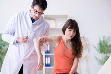 Fototapeta premium Doctor neurologist examining female patient