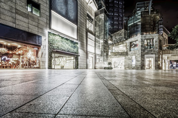 Roads between modern city buildings