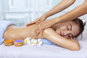 Obraz na płótnie Canvas Asian woman having massage and spa salon Beauty treatment concept.