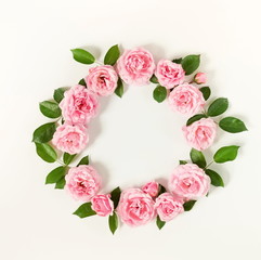 Tropical exotic green palm branches leaves  on a pale blue  background.abstract. top view.copy space