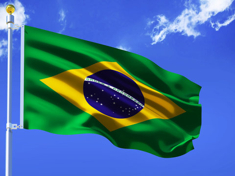 Brazil flag Silk waving flag with emblem yellow rhombus blue circle Order and Progress of Federative Republic of Brazil with a flagpole on a sunny blue sky background with white clouds 3D illustration