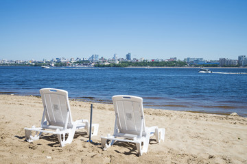 View of the city from the opposite Bank of the Volga river in Samara, Russia. On a Sunny summer day. 28 June 2018