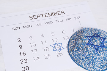 Calendar with kippah. Yom kippur concept.