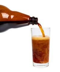 Dark brown plastic bottle of beer or kvass with glass cup isolated on a white background.