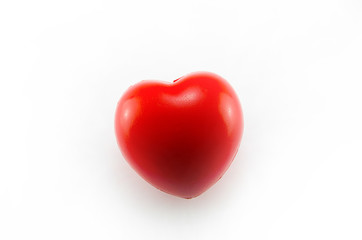 Obraz na płótnie Canvas Valentine's Day concept: a red heart on the white background