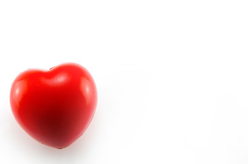 Valentine's Day concept: a red heart on the white background