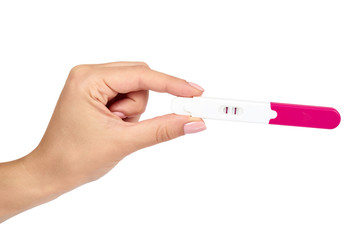 Positive pregnancy test with hand isolated on white background, two lines.