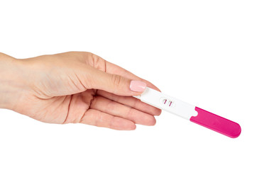 Positive pregnancy test with hand isolated on white background, two lines.